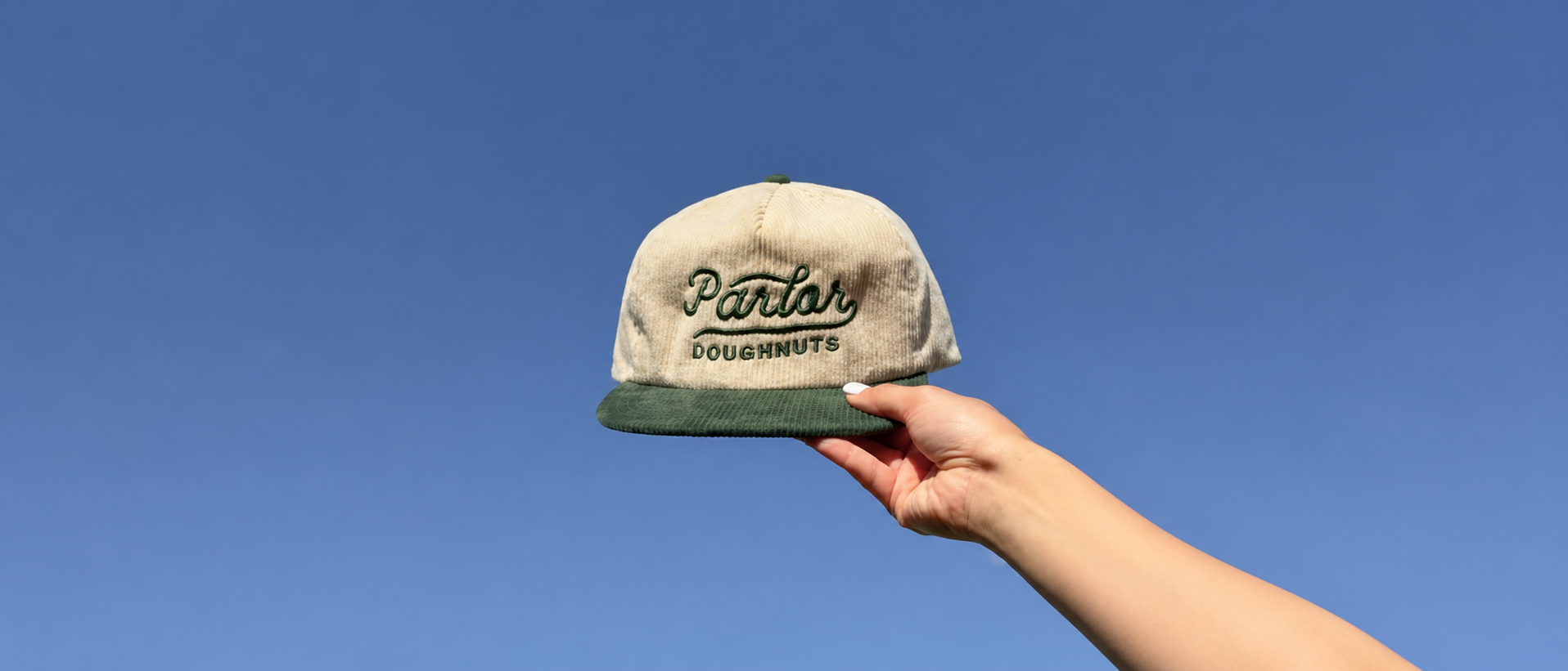 Western hat worn in an open outdoor landscape